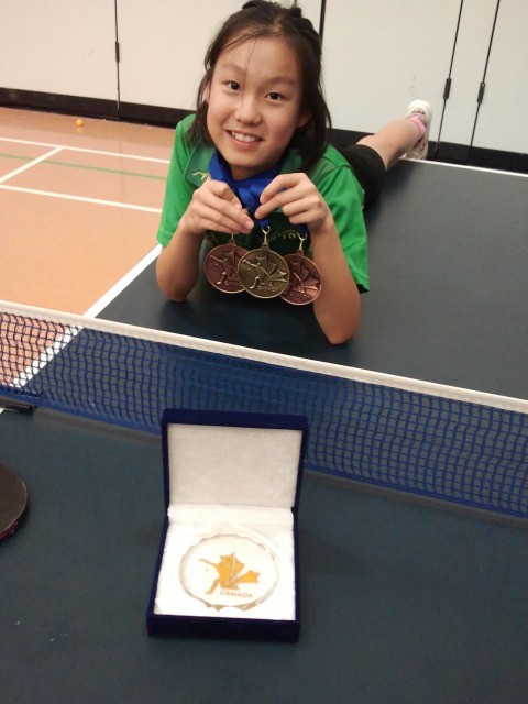 Ann with her medals from the 2012 Junior Canadian Championships